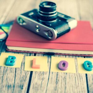 A camera sitting on top of some books